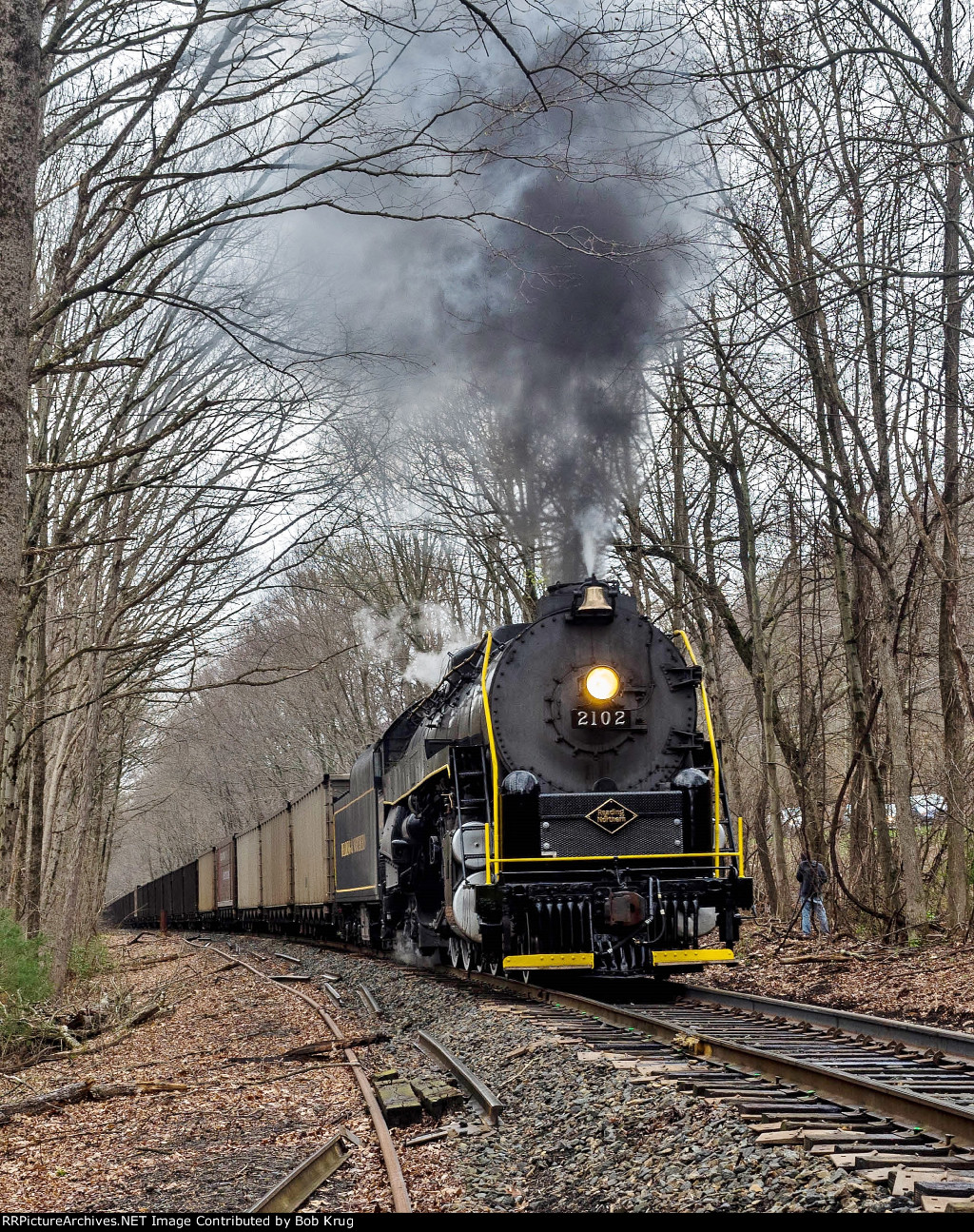 RBMN 2102 westbound in the woods above Lake Hauto on the hometown hill grade